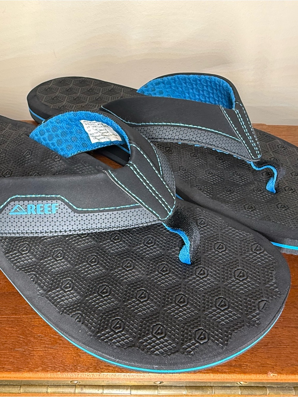 Reef Men's Black and Blue Cushioned Flip-Flops